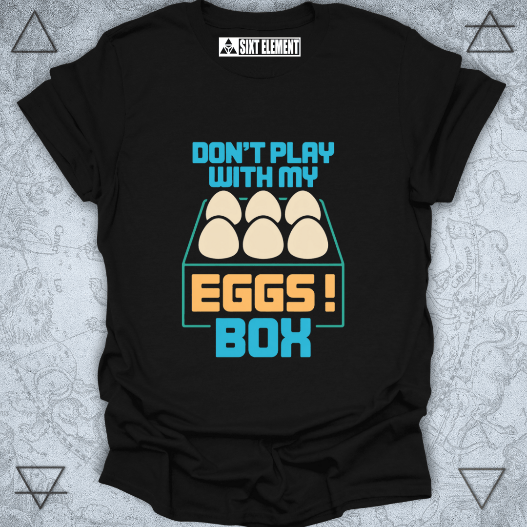Black t-shirt with colorful graphic and text 'Don't play with my eggs box' on a textured background
FUNNY GAMERS T-SHIRT
