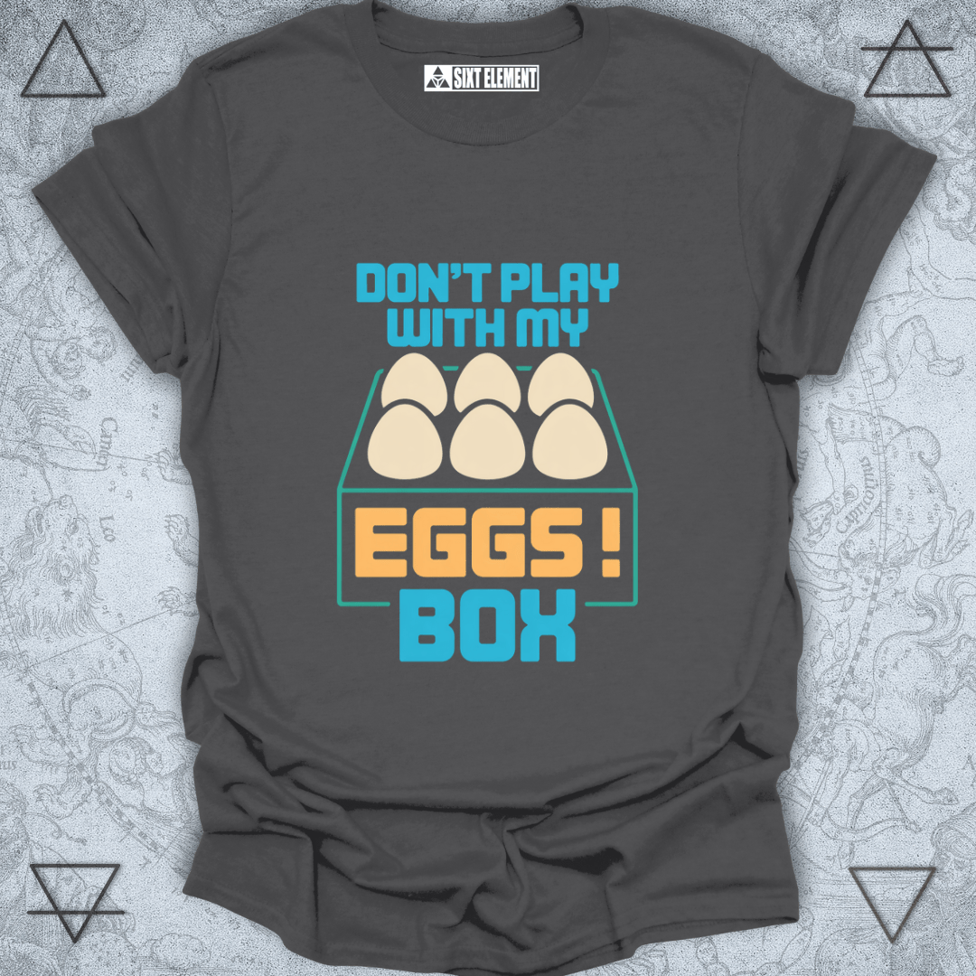 Gray t-shirt with 'Don't play with my eggs box' graphic design on a textured background
FUNNY GAMERS T-SHIRT