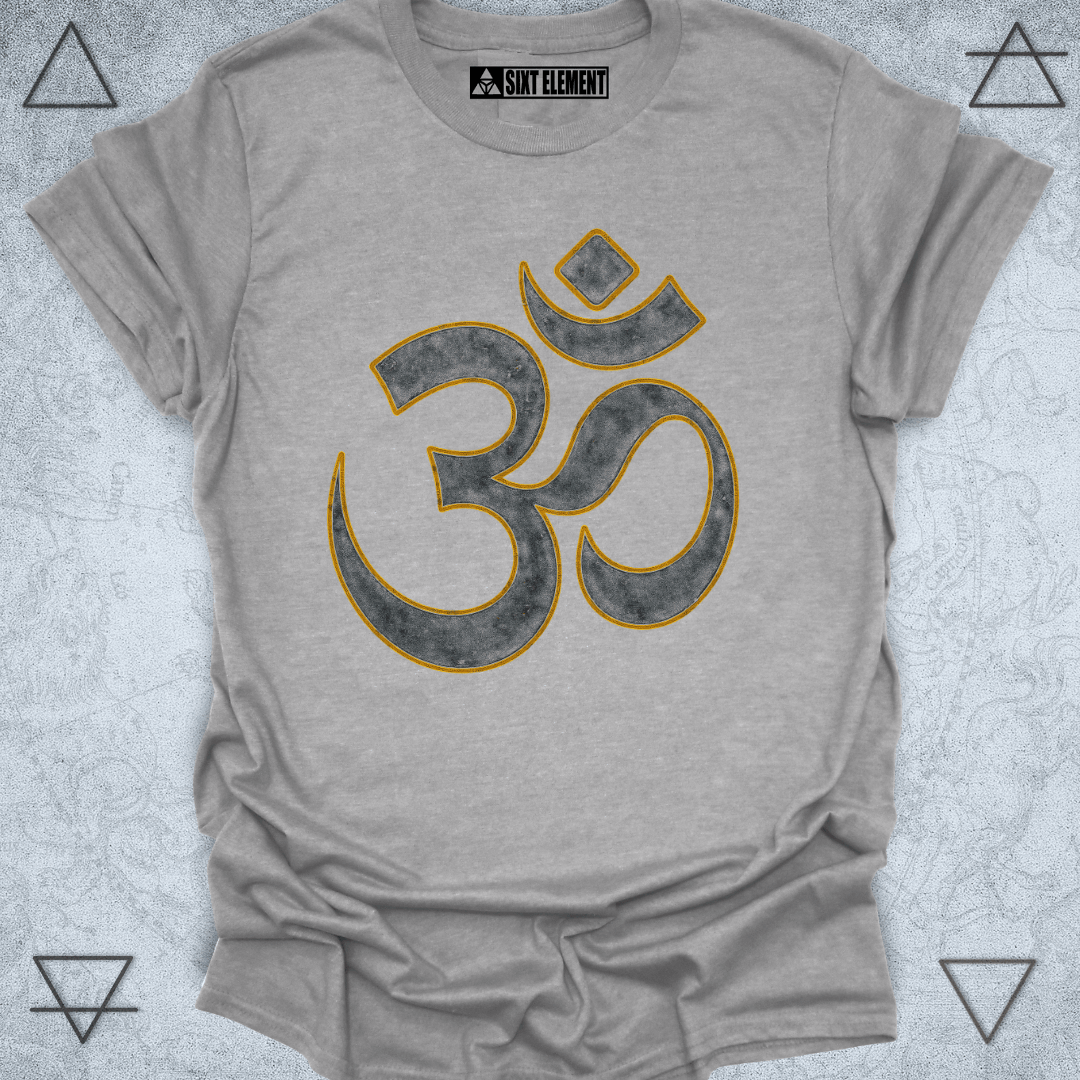 Distressed Om symbol in black and gold for yoga and spiritual T-shirt design, featuring vintage texture on a dark background representing mindfulness, meditation, and sacred sound
